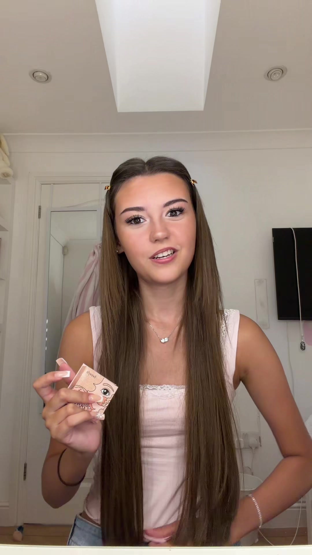 A creator applying foundation during a get-ready-with-me video